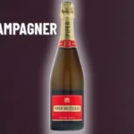 Kessler Rose Brut 0,75l, Flasche in einer gestellten Szene mit gefülltem Glas, zweite Aufnahme